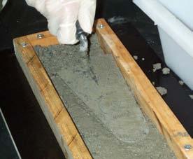 19. To expel the trapped air within the concrete carefully raise one end of the formwork 5cm