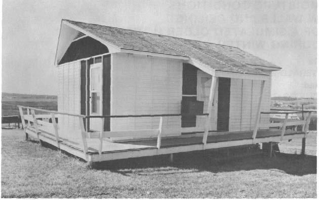 Figure 1. -- The U.S. Forest Products Laboratory test house located on the exposure site near Madison, Wis.