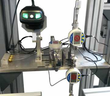 The robot is programmed with all the specimen locations so it knows where to pick the next sample. In this example the specimen racks are arranged on a pneumatically driven frame.