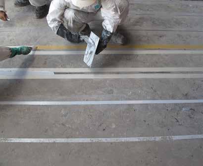 The repair steps to inject the structural cracks were as follows: Install injection ports intersecting the cracks at approximately 45 degrees Seal the top surface of the cracks with appropriate epoxy