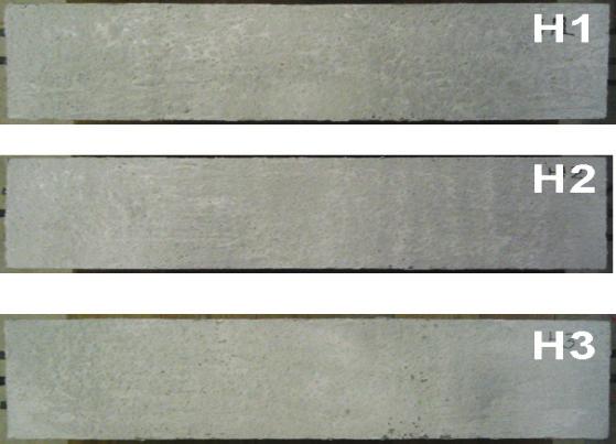 The C designation represents the reinforced plain concrete specimens while the H designation represents that of the reinforced HyFRC. a) b) c) d) Figure 2.