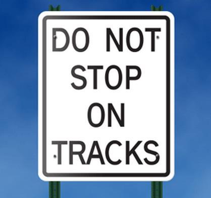 Roundabouts Near At-Grade RR Crossings Four Possible Solutions Sign the tracks with Do Not Stop on Tracks