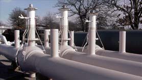 The liquid is measured by detector switches in a specified length of pipe.