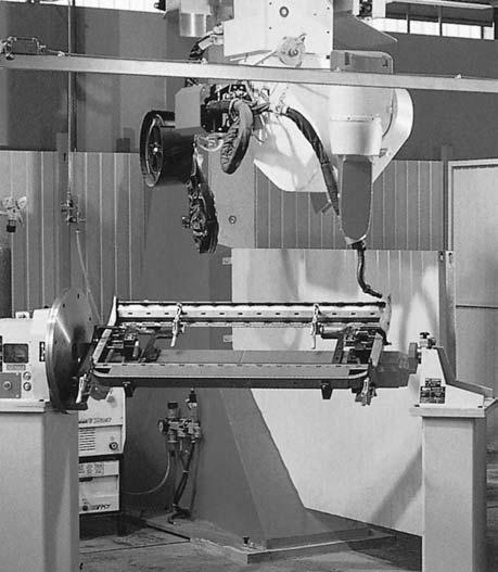 142 The welding of aluminium and its alloys 7.19 Pulsed MIG power source interfaced with a robot and manipulator. Courtesy TPS-Fronius Ltd.