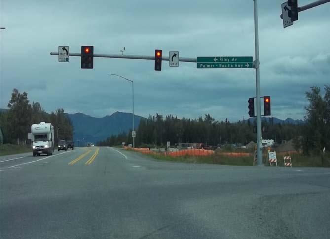 Photo 1: The intersection of KGB Road and Palmer-Wasilla Highway.