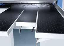 Tiltable air cushion table Prevents thin materials from sagging Increases the work surface Primarily for large panels Folds down for easy access to the cutting line Air cushion tables