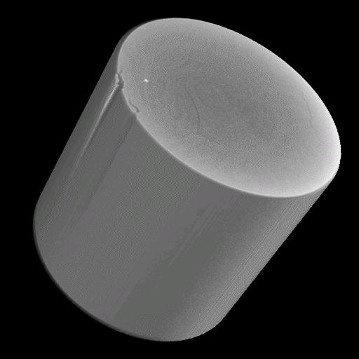 Fig. 7. 3D µ-ct image (left picture) and cross section parallel to the fibre structure (right picture) of a carbon-fibre compound material (CF-PEEK). The diameter of the sample is 4.7 mm.