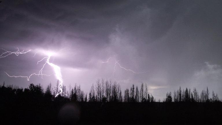 As Peat Bogs Burn, a Climate Threat Rises By HENRY FOUNTAINAUG. 8, 2016 A lightning storm in Utikuma Lake, Alberta, in June. The area was burned from the 2011 wildfire.