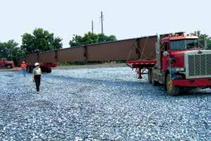 By confining aggregate infill, the system improves the load distribution characteristics of unpaved roads and pavement areas, reducing long-term maintenance requirements and costs.
