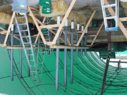 Figure 8 Test setup, showing racks to hold pipes,