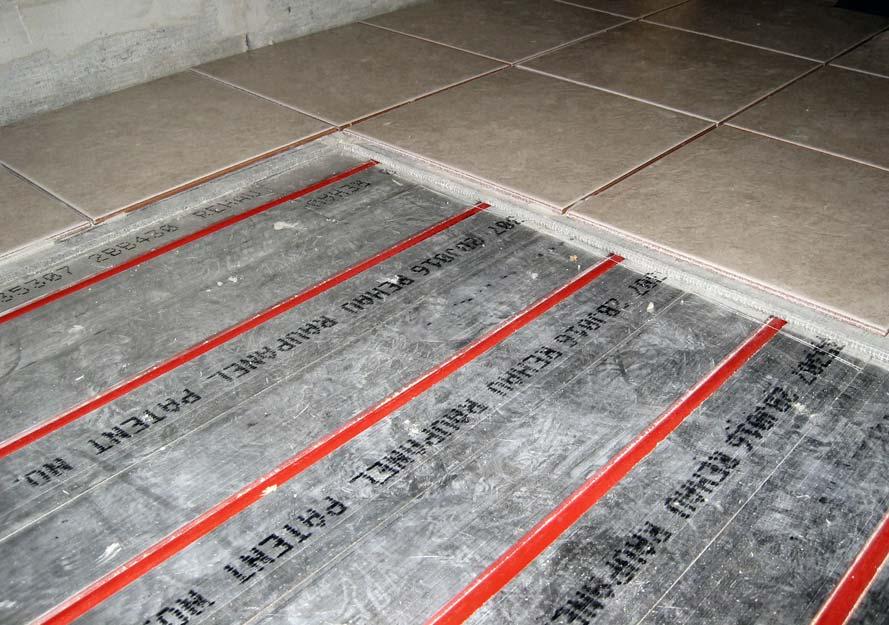 RAUPANEL INSTALLATION TILE FLOORS USING MORTAR BOARD AS ALTERNATIVE TO DIRECT PLACEMENT OF THINSET Sample cutaway floor: - 1/4 thick mortar board installed directly over RAUPANEL at 6 o-c spacing