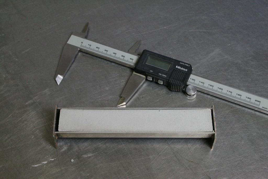 Figure 14 - Plastic limit test specimens adjacent to 3mm diameter guide rod (Earl 2010) Shrinkage limit (SL) Linear Shrinkage