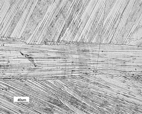 Fig. 11 [120] 120-W 24-mm/s laser weld as viewed from the top surface. Centerline grain found in this weld was observed along the entire length of the metallographic mount.