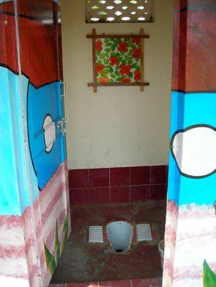 DSK campus sanitation complex Sanitation complex comprises 22 toilets Constructed as a circle with a biogas plant in the