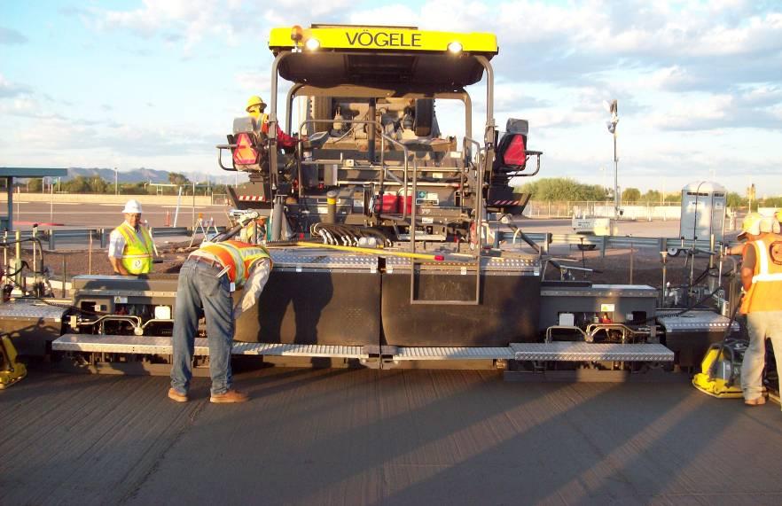 RCC IS PLACED WITH ASPHALT PAVERS Achieving Density & Smoothness is Critical Standard Paver Low initial density from paver (80% - 85%) Available in all locations