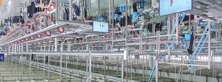Garment Sorting Conveyor is a continuous moving rail system with 12 slots on each frame, assisting in disseminating garments from point to point.