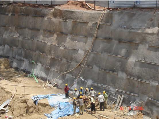 From the geotechnical and drivability considerations, protection system with driven nails was considered to be not feasible and hence protection system with grouted nails was the option.