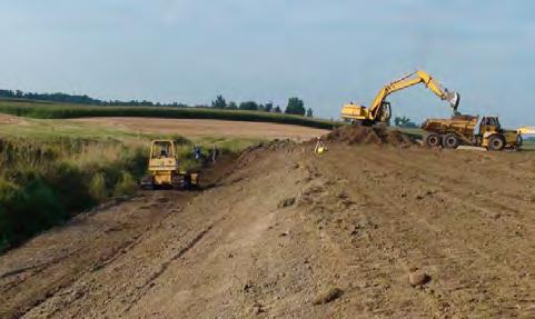 Earthwork - includes equipment mobilization, site preparation, excavation, hauling, and disposal of soil removed during construction (Figure 4).