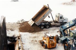 pier excavation with a bobcat 2-3 Compact