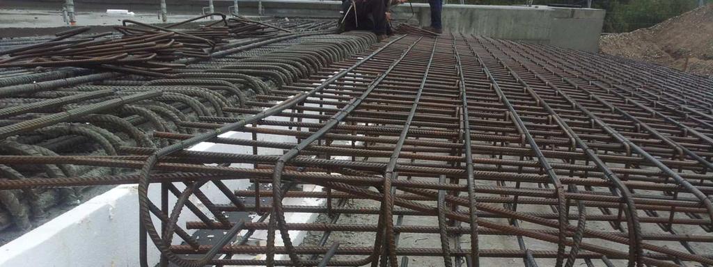 It is impossible to consider the deck completely blocked in the approach slab (tensile
