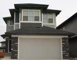 The gently sloping roofs and low proportions are reminiscent of the landscape of the prairies. 5.3.