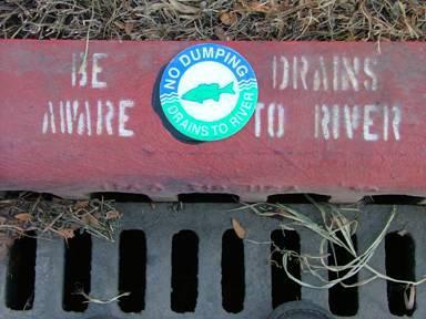 Signage and Reminders Post reminder signs Close lids Don t dump, drains to river