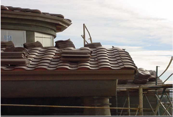 Tile Roofing J. Valley Flashings: 1. All valley shall be minimum 28 gauge galvanized metal, 24 inch wide "W" type with hemmed edges and a raised diverter down the center. 2. All valley metal shall be installed over at least one layer of 36-inch wide, 30-pound felt.