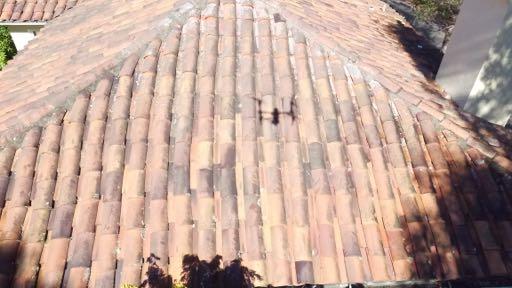 IN VIOLATION OF SAFETY CODE AND NEEDED TO BE CORRECTED. WE BELIEVE THAT MOST OF THE DAMAGE TO THE ROOFING TILES WAS DONE AT THE TIME WHEN CHIMNEY, STUCCO AND PAINTING CONTRACTORS WERE ON SITE.