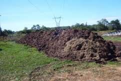 Composted manure slowly releases nutrients into the soil and can improve the biological, chemical, and physical properties of the soil.