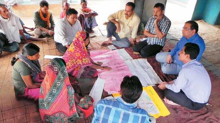 26 Members of a self-help group discussing village development plan with Trusts officials Professional Assistance for Development Action (PRADAN), Dhamtari in Chhattisgarh training the project will