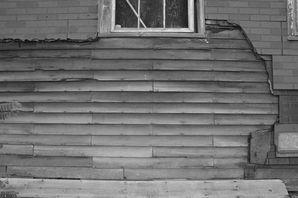 -22 Detail of original pine clapboard siding, all four-foot lengths, remaining