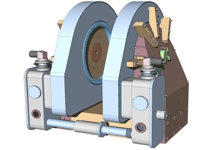 The Magnet MR Open Magnet assembly The magnet consists of a U-shape ferromagnetic yoke and two MgB 2 coils (one for each pole, 12 DP