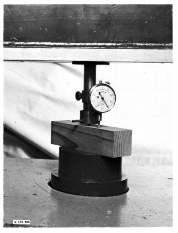 FIG. 13 Janka-Ball Hardness Tool Equipped with a Micrometer Dial for Measuring Penetration 79. Speeding of Testing 79.