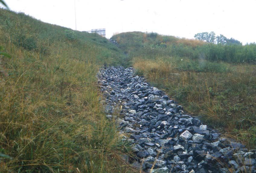 4.3 Rock Lined Channel Description A channel that is shaped or graded and protected with an erosion resistant rock riprap underlain with filter or bedding material used to convey stormwater runoff