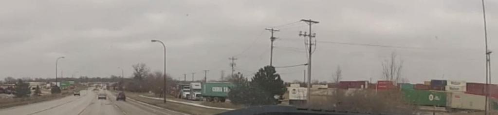 Figure 4-16: University Avenue near CP Yard, Photos of Truck Queuing 1.