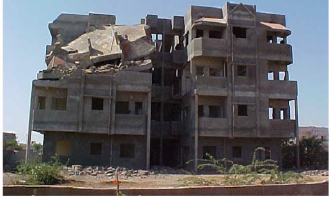 damaged in Gujarat during 2001 Bhuj earthquake because of discontinuity in load path at lower, upper stories suggested by clients, architectures due to site requirement and improper planning as shown