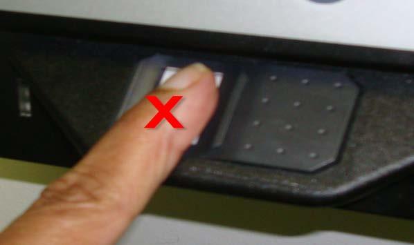 the Fingerprint Reader. Figure 1 Place the finger straight and flat at a 45 degree angle with firm pressure on the Fingerprint Reader for at least 3 seconds.