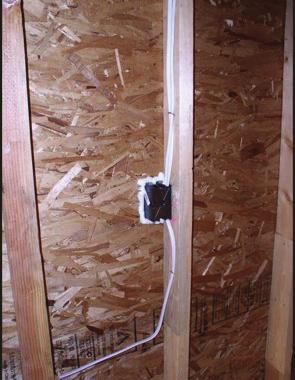 i) Hard to access wall stud cavities, such as corner channels, wall intersections, and behind tub/shower enclosures shall be insulated to