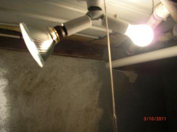 Railings loose light fixture Outlets in basement should be GFCI due to