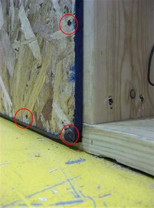 Note the significant pullout of nails and separation of sheathing from the studs in Figure 3.8a indicating significant damage in the conventional wall (peak drift of 3.