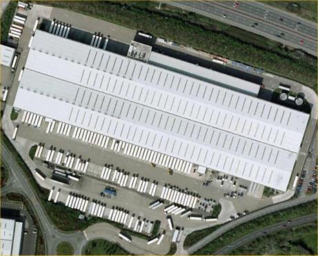 Figure 1: Aerial view of a distribution centre showing lines of closely parked trailers CFD prediction Flame speed Experimental Distance