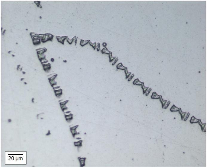 The nominal horizontal AM sample exhibited a unique set of patterned inclusions in the shape of bow-ties (Figure 34b), which could be an artifact of the build direction. a) b) Figure 32.