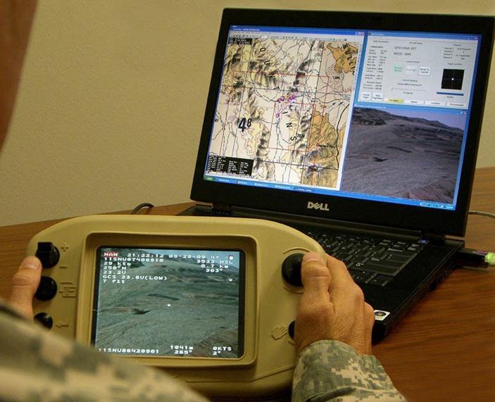 Figure 2. The actual displays of the laptop and hand controller. For the stock GCS, the vehicle operator (VO) uses the hand controller for launching and various manual control modes.
