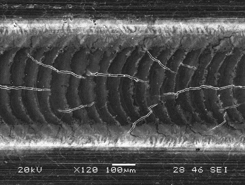 WELDING RESERCH C C Fig. 6 Severe solidification cracking in a weld made with a rectangular pulse shape with a peak power density of 11.