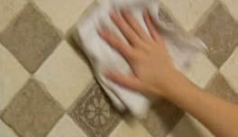 Press the grout into all joints using several sweeps. If grout is hard to remove, use a white plastic fine scrub pad, rinsing it often.