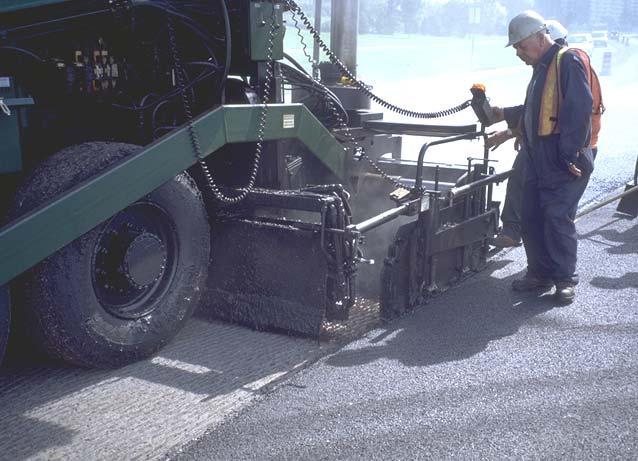 A B Figure 7 Application of Nova Chip on Anderson Street, Whitby in 1998. The close up compares the Nova Chip surface texture (A) with the conventional HL 1 surface course texture (B).