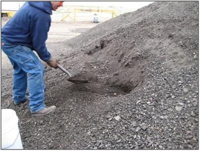Chapter 3 - Reclaimed Asphalt Pavement in Asphalt Mixtures: State of The Practice, Apri... Page 8 of 15 Testing and Test Frequency Figure 19. Photo. Sampling RAP from the stockpile.