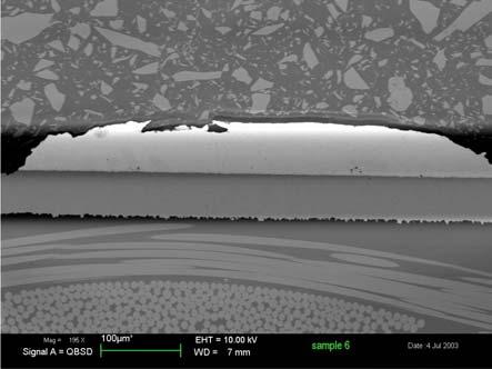 Fracture within the solder, nearby the Ni/Sn IMC Image 3: SEM image of a x -section (25x mag.) of the NiSn IMC on an 8.