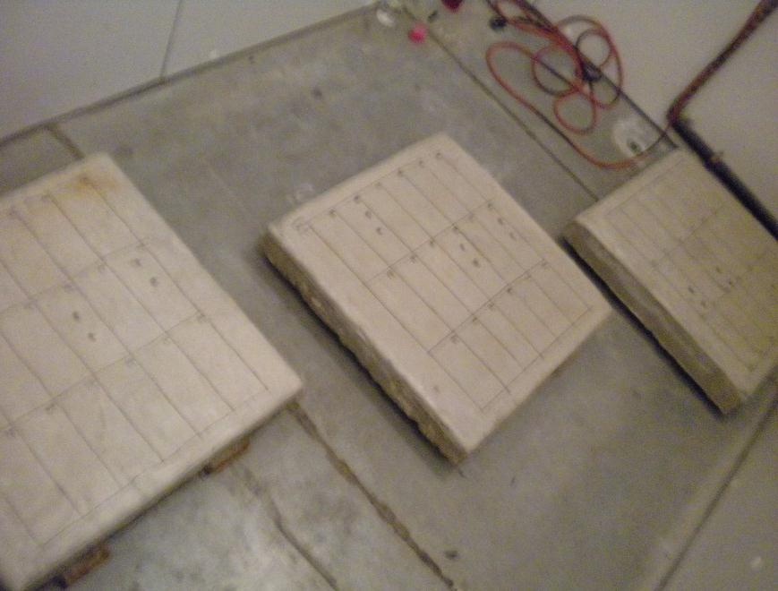 Figure 3-12: Concrete slabs prepared for experimentation on concrete material variables. resistivity testing was completed at each temperature within a 24-hour period in every case.
