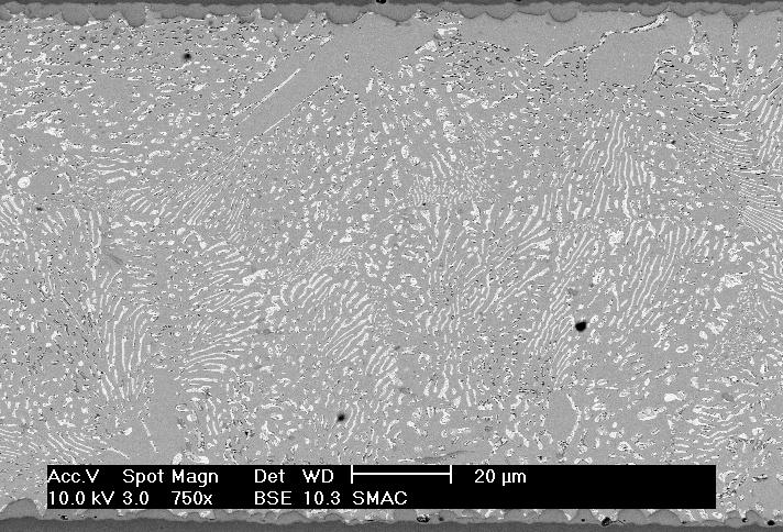 It shows the microstructure and the presence of an intermetallic compound (IMC) at the interface of the solder to the copper pad.